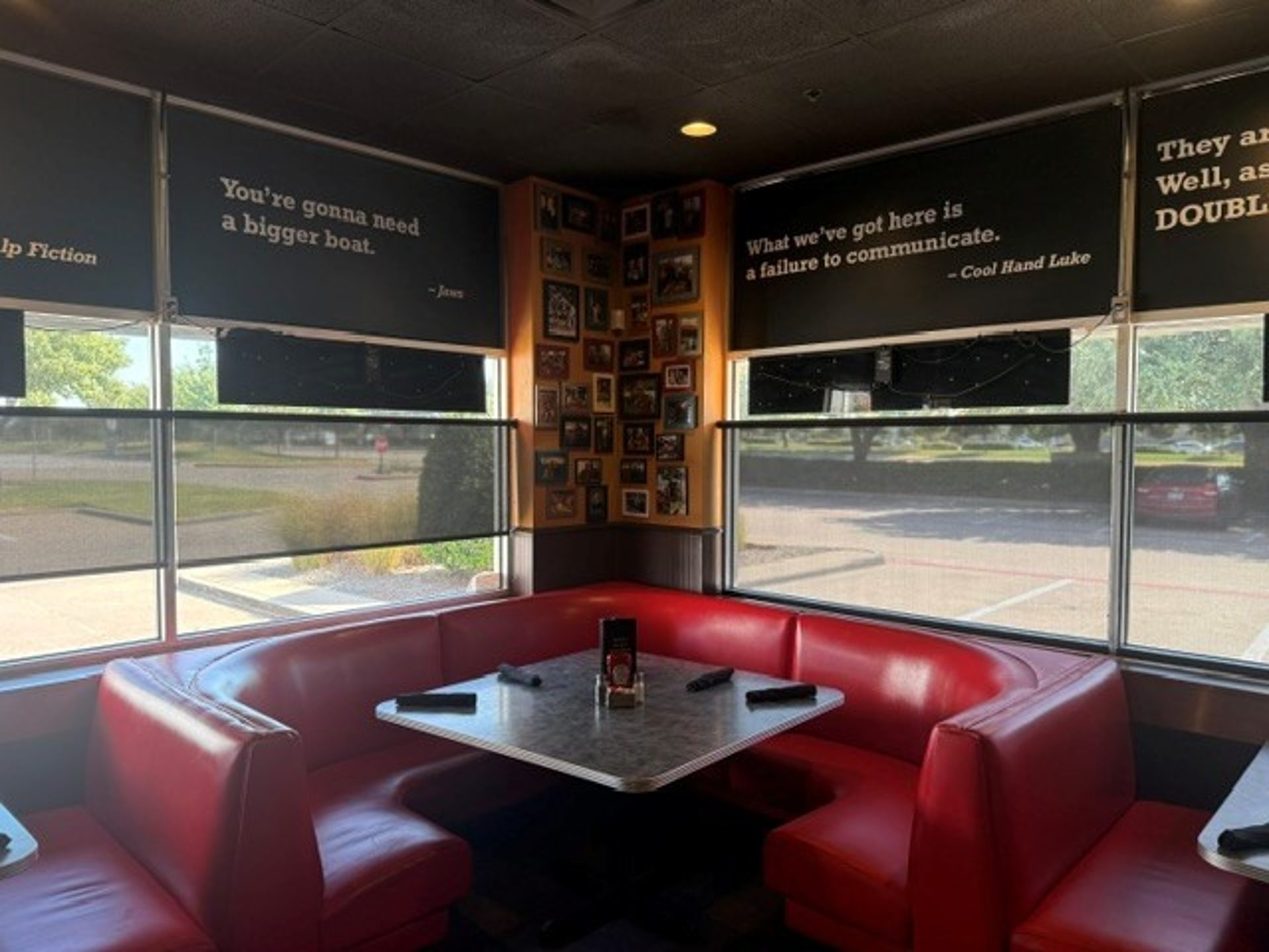 Red neon booths and memorabilia walls